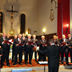 Il coro “Monteverdi” diretto da Matjaž Šček durante il concerto nel Duomo di Muggia. (foto Covassi)