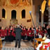 2012 - Il Coro “Monteverdi” ed il Coro “Ozvena” riuniti nell’esecuzione del brano “Graduale – Locus Iste” di Anton Brucker, diretti da Sergej Mironov (foto Covassi).