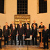 2013 - Il Coro “Monteverdi” schierato nella Basilica di Sant’Eufemia a Grado, diretto da Matjaž Šček (foto Covassi).