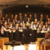 2013 - Il Coro “Monteverdi” ed il Coro “Oriana” durante l’esibizione del “Graduale – Locus Iste” di Anton Bruckner, diretti da Galina Shpak.